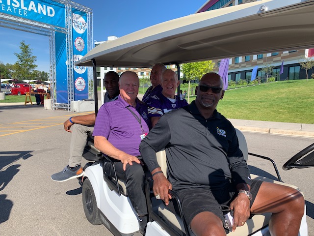 Former Viking players stopped by to view cars